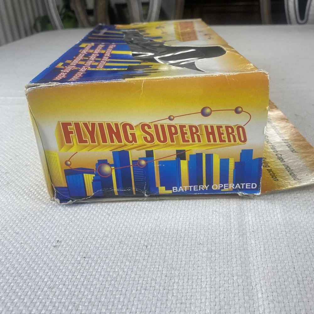 Flying Super Hero Action Figure Toy Battery Operated Cape Included Spins In Air